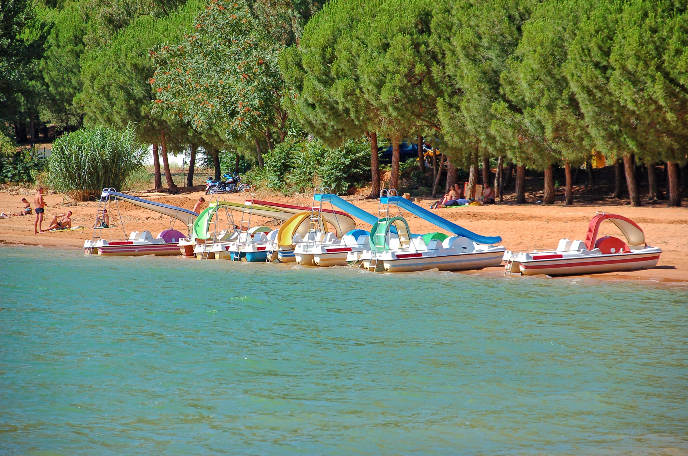 Beach playa Iznajar Andalucia Swim sail Kayaks pedalos